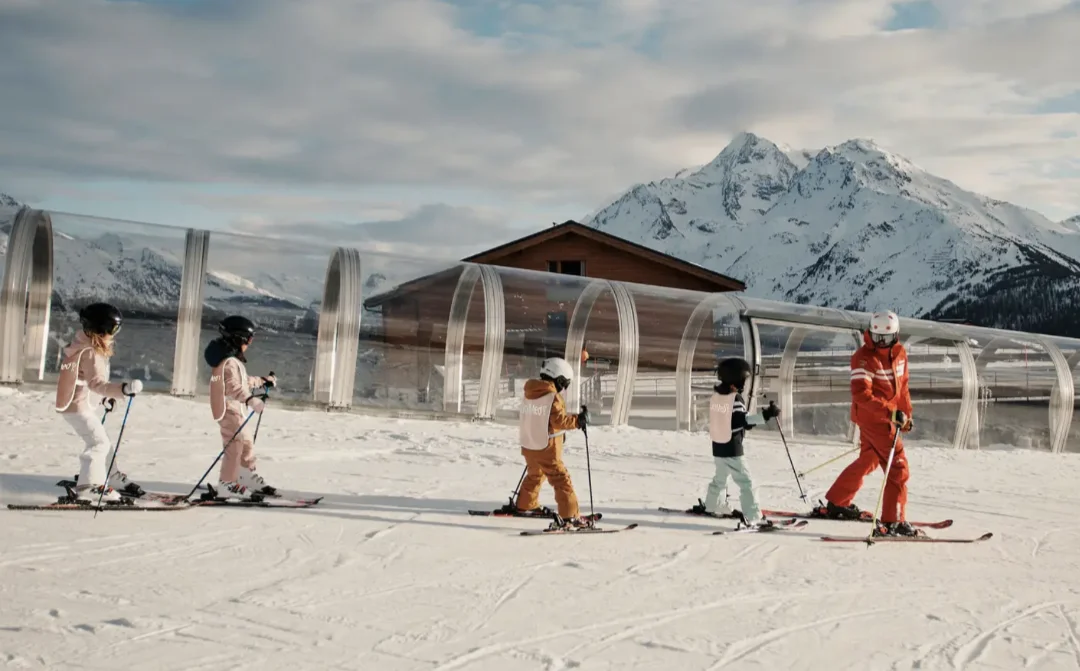 Children skiing in a kid's ski lesson