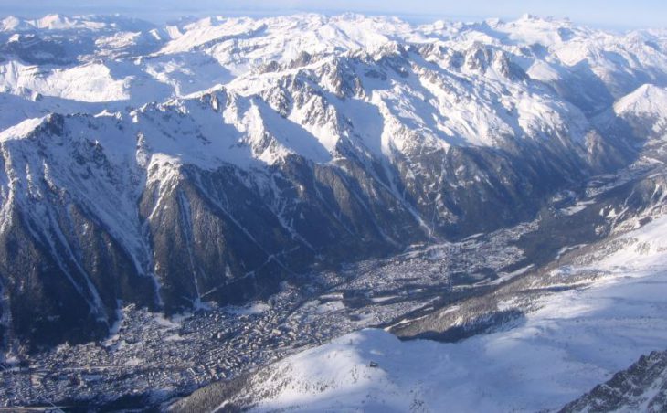 Chamonix Ski Holidays - Chamonix resort shown from above, nested between the mountains