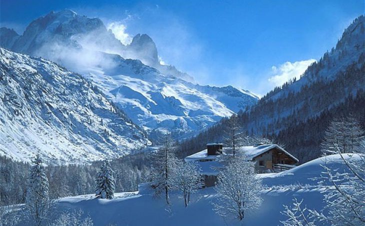 Chamonix Ski Holidays - A snow capped ski chalet in the snowy Chamonix landscape